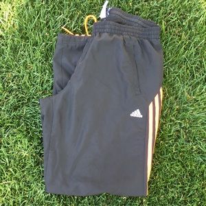 Adidas track pants…